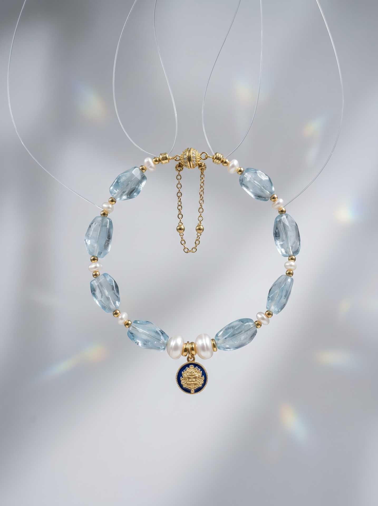 Kubera Azure Topaz Himalayan Bracelet — on rose quartz prop