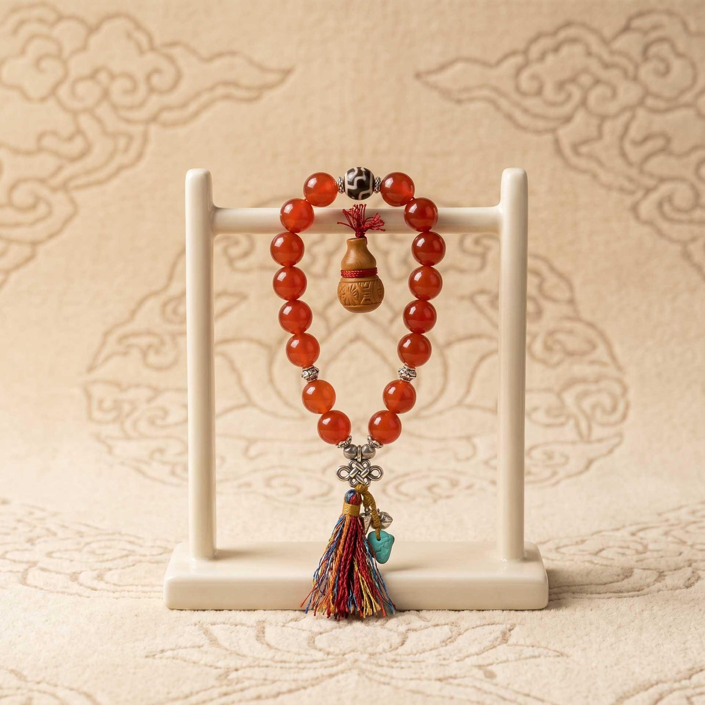 Vessel Dorje Red Agate Bracelet — main product photo on stand